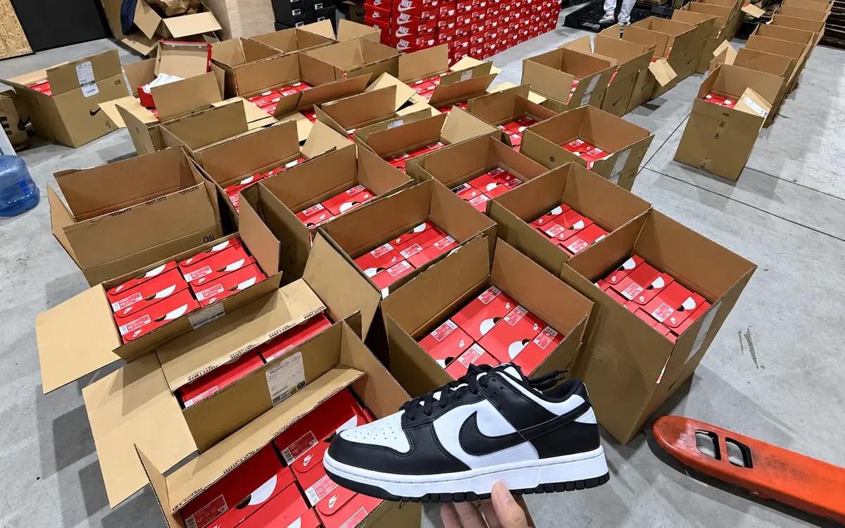 Open cartons prepared for wholesale sneaker order packing