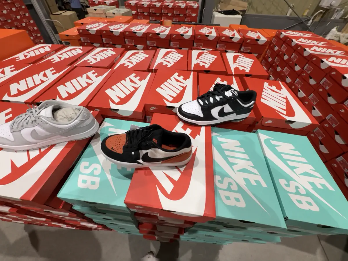 Sneaker styles displayed with wholesale inventory boxes